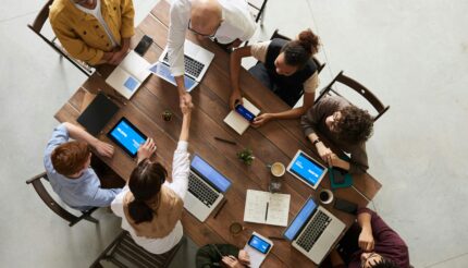 A group of people around a table.